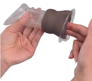 Training Model for a Female Condom, Dark Skin